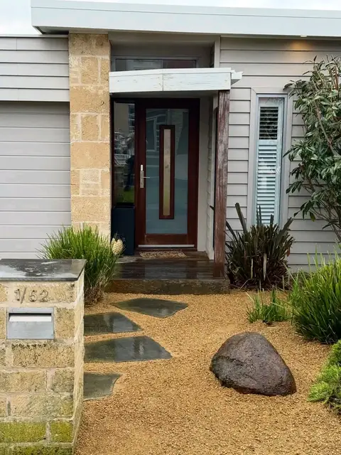 Mown lawn, stone wall and cloud-pruned tree (3 of 4)
