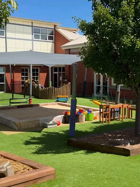 Garden and play area with raised beds